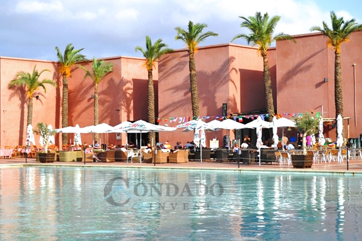 Terrace restaurant and pool at Condado de Alhama