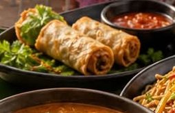 Golden crispy spring rolls with sweet chilli dip