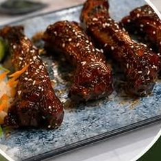 Sticky glazed pork ribs with sesame seeds